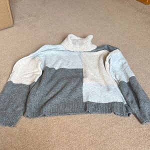 Elegant Gray and Cream Turtleneck Sweater